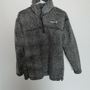 This is a small Seattle Seahawks fuzzy sweatshirt.